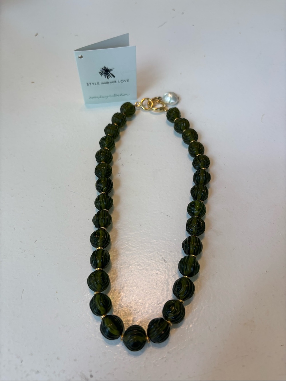 Noonday Collection Dark Green Swirl Bead Necklace with Gold Accent